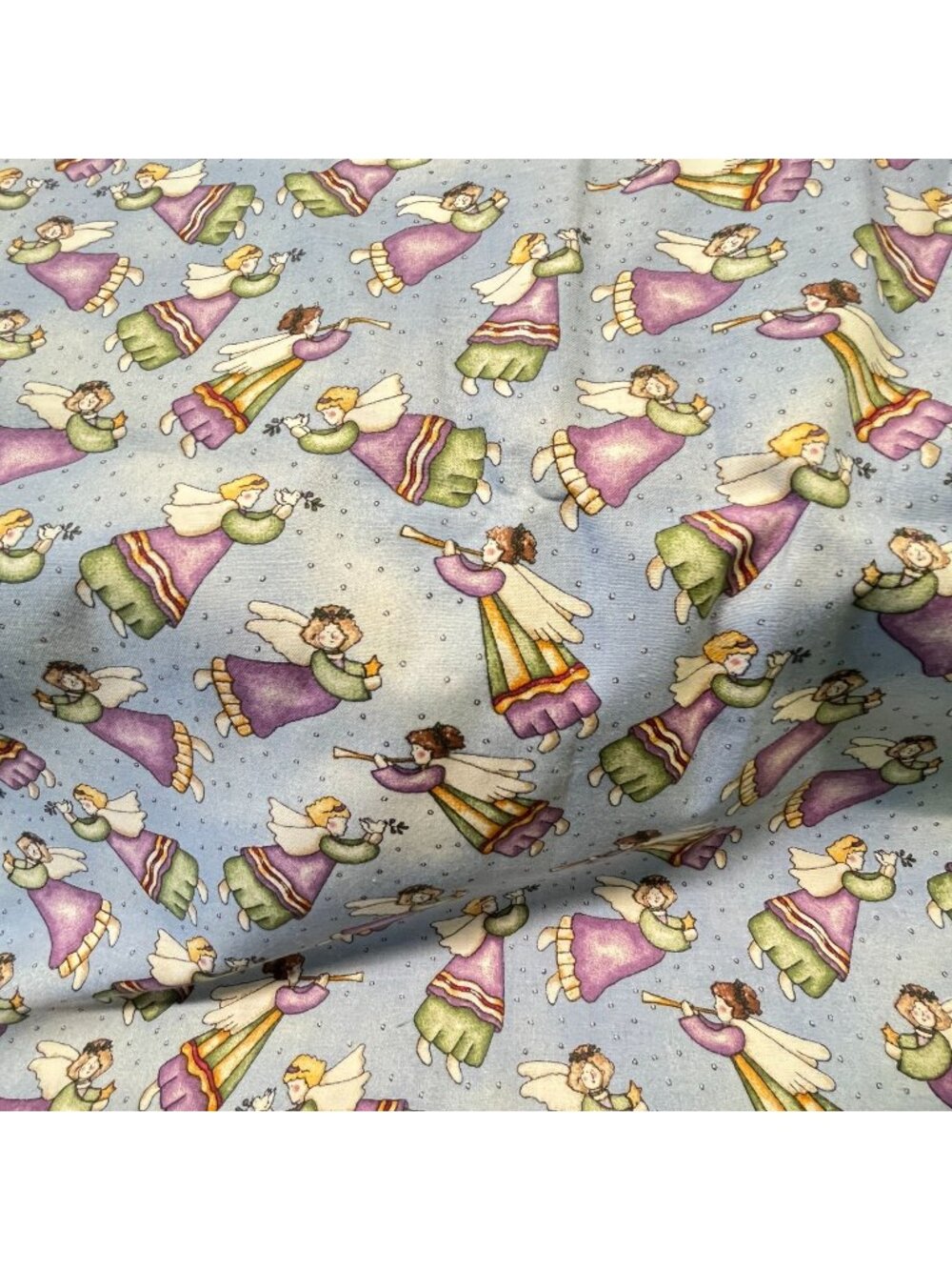 Angels on Blue Fabric Remnant Dianna Marcum for Marcus Brothers Quilting Cotton